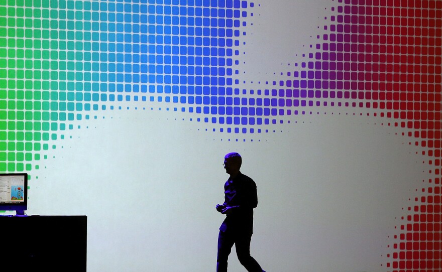 Apple CEO Tim Cook walks off stage after speaking during the Apple Worldwide Developers Conference in June.