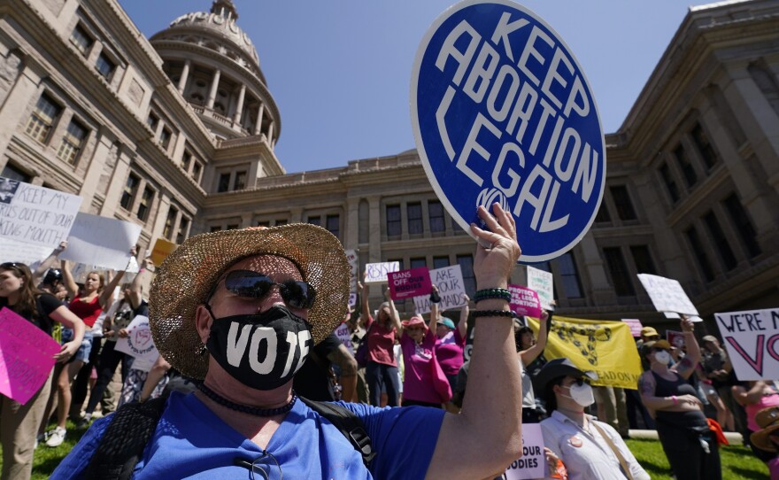 Abortion rights demonstrators attend a rally at the Texas state Capitol in Austin, Texas, May 14, 2022.