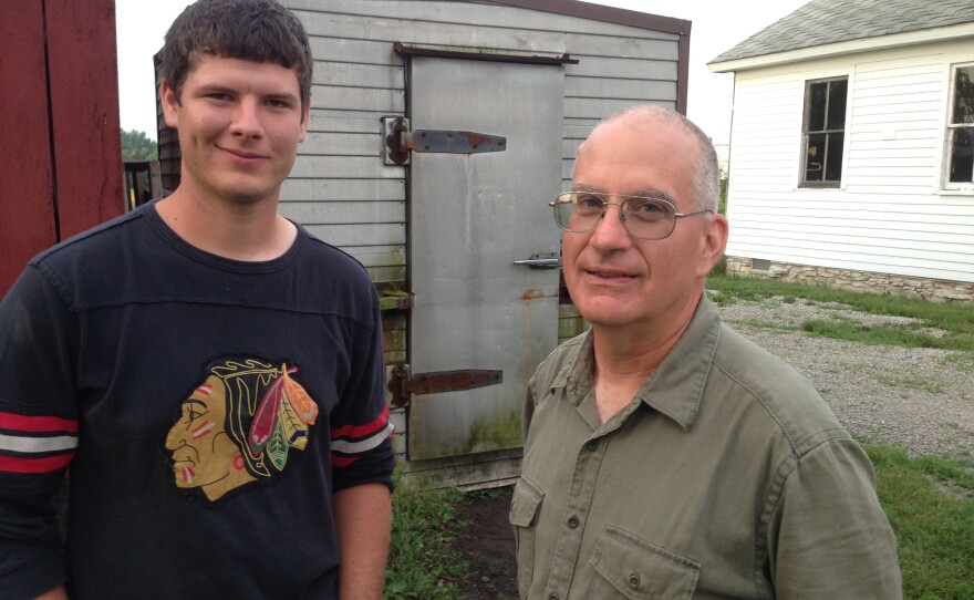 Marty Travis (right) started the Stewards of the Land food hub in 2005. His son Will helps him transport food from local farms to area restaurants.