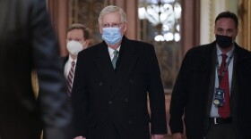 Senate Minority Leader Mitch McConnell, R-Ky., arrives at the Capitol in Washington, Thursday, Feb. 11, 2021. 