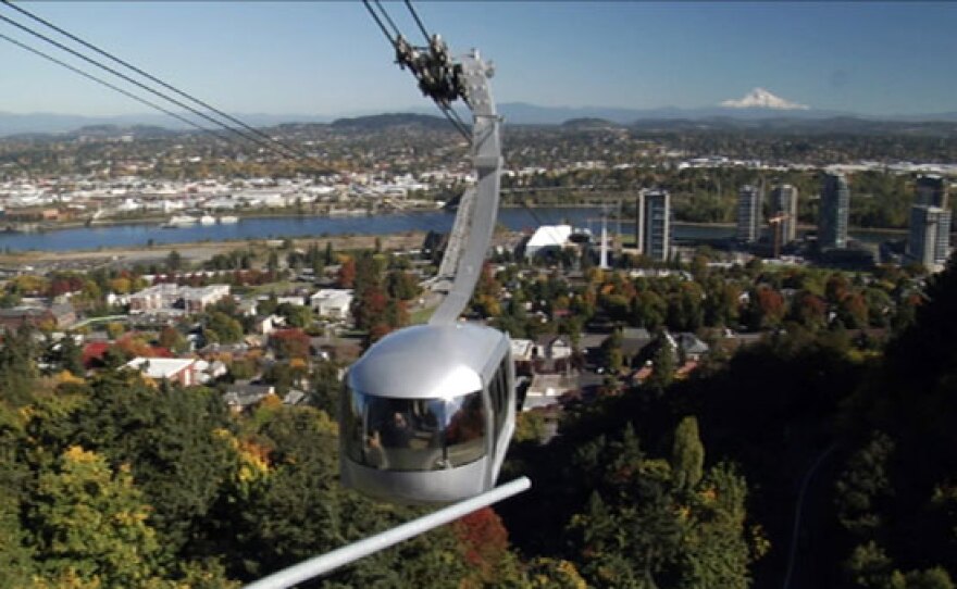 The third film in the MAKING SENSE OF PLACE series profiles Portland, Oregon. With its alternative transportation, distinct urban boundary and overall green sensibility, can Portland continue to contain its growth and still satisfy all of its inhabitants? Pictured: Portland Aerial Tram