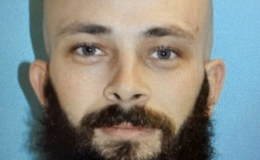 This image provided by Boise Police Department shows Nicholas Umphenour, identified by police as the man suspected of shooting corrections officers at a Boise hospital to free an inmate.