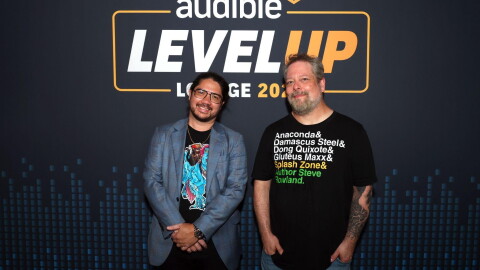 Author Matt Dinniman and audiobook narrator Jeff Hays attend the "Level-Up Lounge" activation in downtown San Diego on July 25, 2026.