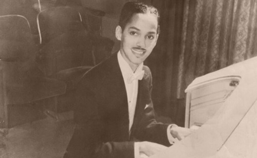 A young Korla Pandit playing a piano. (undated photo)