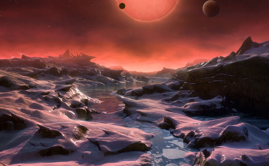 The three planets depicted in this rendering have sizes and temperatures similar to those of Venus and Earth. They were discovered using the TRAPPIST telescope at the La Silla Observatory in Chile.