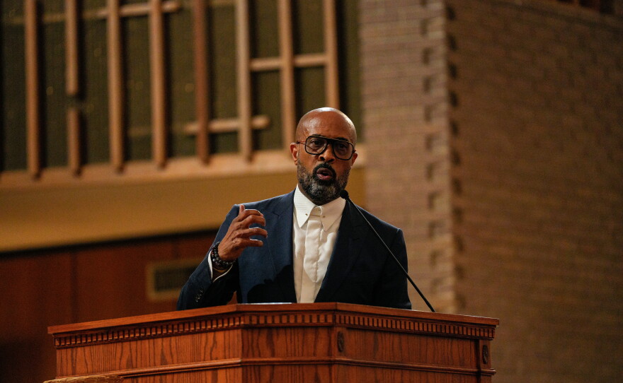 The Rev. Frederick Haynes III speaks to the crowd during the We the People TX interfaith service, "A Night of Moral Resistance," in Dallas in September.