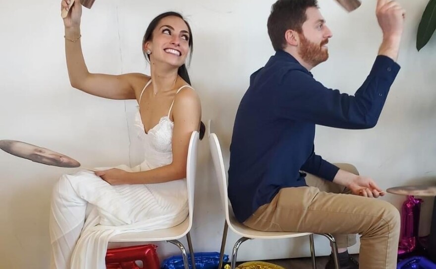 Jenna Mantis celebrates at her bridal shower with her fiancé Sam Cutler, in advance of their April wedding. As COVID-19 cases are ticking back up, and state restrictions are lifting, they are imposing their own rules, asking guests to send proof of vaccinations and negative PCR tests.