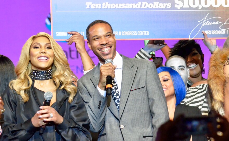 James Bronner and R&B star Tamar Braxton present the 2016 Hair Battle winner with a $10,000 prize.