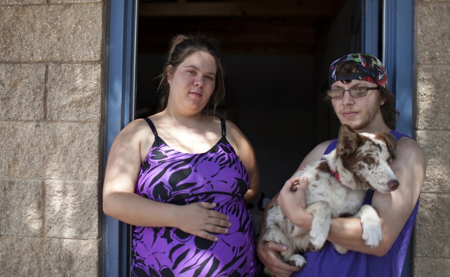 Baylee Jackson (left) and Kyle Proctor, evacuated from Corpus Christi on Aug. 25, as Hurricane Harvey was making landfall on the Texas coast. The couple, who are expecting their first child on Sept. 20, say that the people at Inks Lake State Park have been very helpful. Volunteers have brought baby clothes and have helped the couple find a doctor for Baylee.