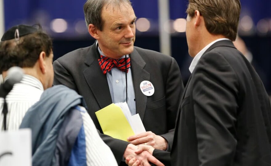 Charles Munger Jr. chairman of the Santa Clara County Republican party, center, talks with Assemblyman Brian Jones, R-Santee, right, at the California Republican Party convention in Sacramento, Calif., Sunday, March 3, 2013.