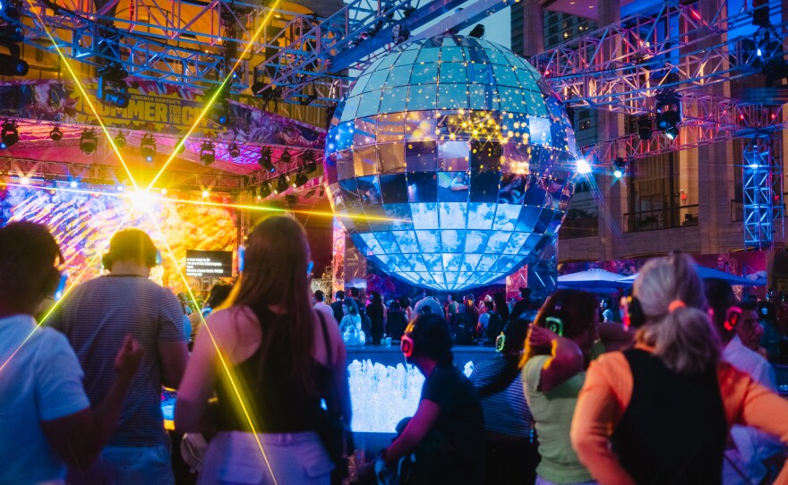 DJs, dancers, spectacular lighting and screens with captioning were on display at the Silent Disco dance party at Lincoln Center, New York City, on Saturday, July 1, 2023.