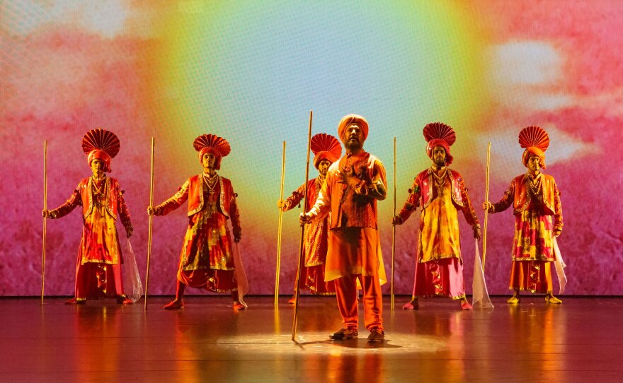 The cast of "Come Fall in Love – The DDLJ Musical" are shown in a 2022 production photo at The Old Globe.