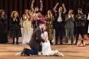 Oscar Diaz and Janelly Mendoza (kneeling), from Laredo, TX, were married on stage on June 11, after a performance of Romeo and Juliet at the Public Theater's Delacorte Theater, (would add: in New York)