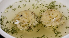 Matzo ball soup with dill. Matzo represents the unleavened bread the Jews ate while fleeing Egypt.