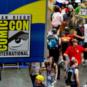 Attendees walk through the exhibit hall of the San Diego Convention Center during Comic-Con, July 23, 2026.