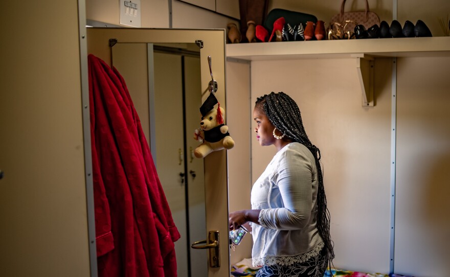 Londeka Noxolo Zulu, manager of the eye clinic on the Phelophepa, leaves her cabin to attend to patients. The train — which accommodates 22 permanent medical staff, around 40 medical students and 15 support personnel — has been Zulu's primary home for more than eight years.