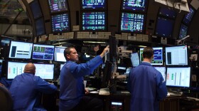 Traders work on the floor of the New York Stock Exchange at the end of the trading day on September 4, 2009 in New York City. 