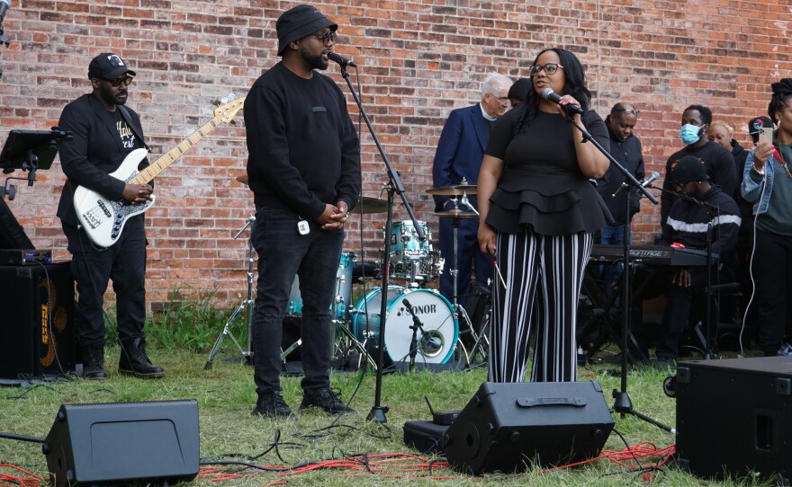Kelly Diane Galloway speaks to the crowd during Tuesday evening's vigil in Buffalo.