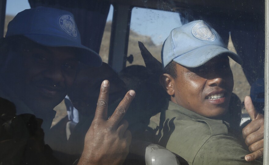Fijian U.N. peacekeepers released by the group Nusra Front in Syria on Thursday as they arrive in Israeli-held territory on the Golan Heights.