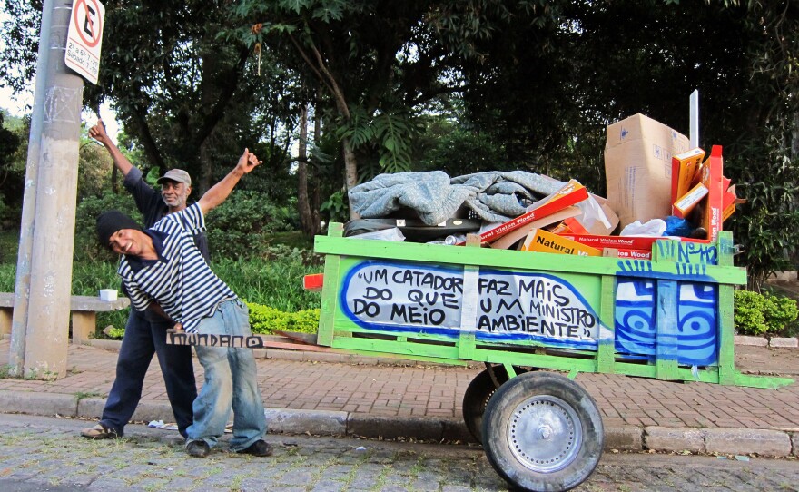 Trash pickers collect 90 percent of waste that gets recycled in Brazil yet local governments give them little support. The message on this cart: "One catadore does more than an environmental minister."