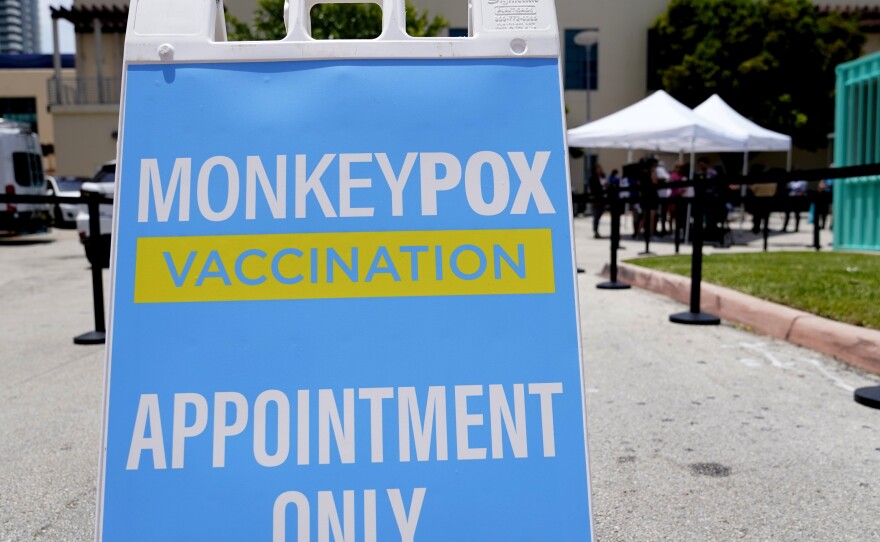 A sign for monkeypox vaccinations is shown at a vaccination site in Miami Beach, Fla.