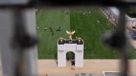 A mock-up of President Trump's proposed triumphal arch, pictured during the state fair on D.C.'s National Mall in June. The real thing needs to undergo a historic preservation review before it can be approved.