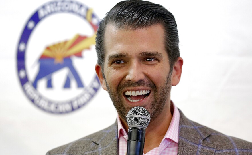 Donald Trump Jr. spoke at a campaign rally for Sen. Martha McSally in 2018. He and President Trump welcomed reports Thursday that they didn't talk on the phone ahead of a June 2016 Trump Tower meeting with Russians.