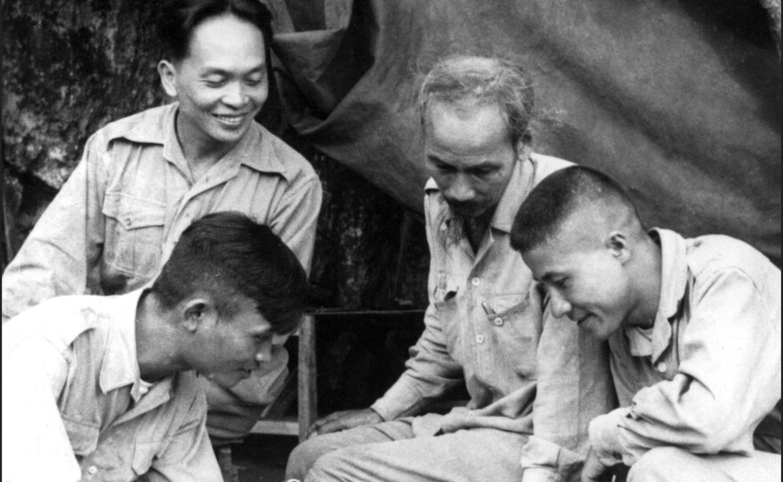 Gen. Vo Nguyen Giap (back) with Vietnamese President Ho Chi Minh (second from right) and other advisers in 1950.