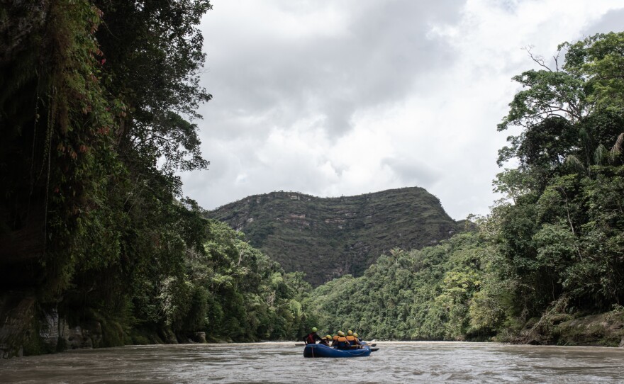 Tourists raft down the Guejar River in an area that used to be controlled by FARC rebels.