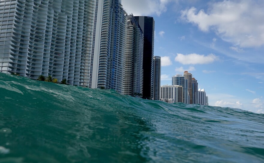 Waves lap ashore near condo buildings in Sunny Isles, Fl., on Aug. 9, 2021. Rising sea levels are seen as one of the potential consequences of climate change and could impact areas such as Florida's Miami-Dade County.