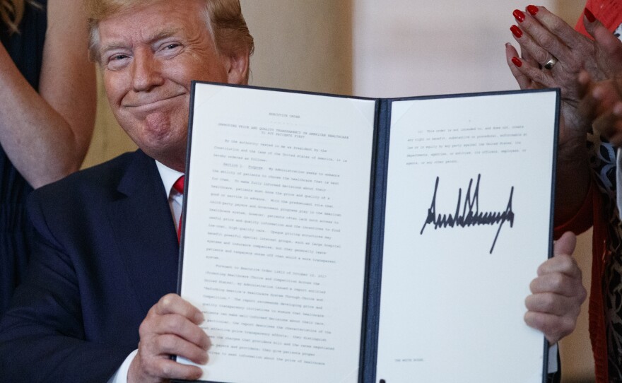 The executive order on drug price transparency that President Trump signed Monday doesn't spell out specific actions; rather, it directs the department of Health and Human Services to develop a policy and then undertake a lengthy rule-making process.