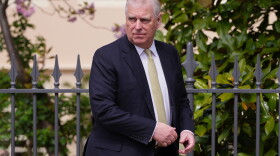 FILE - Britain's Andrew Mountbatten-Windsor, formerly known as Prince Andrew, looks round as he leaves after attending the Easter Matins Service at St. George's Chapel, Windsor Castle, England, April 20, 2025.