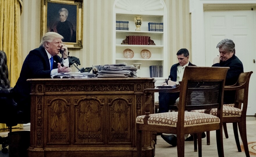 Steve Bannon (right) joins President Trump and national security adviser Michael Flynn in the Oval Office on Saturday during a call with Australian Prime Minister Malcolm Turnbull.