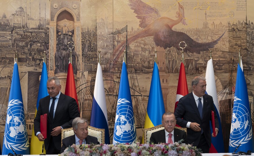 Turkish President Recep Tayyip Erdogan, center right, and U.N. Secretary General Antonio Guterres lead a signing ceremony Istanbul, Turkey, on Friday.