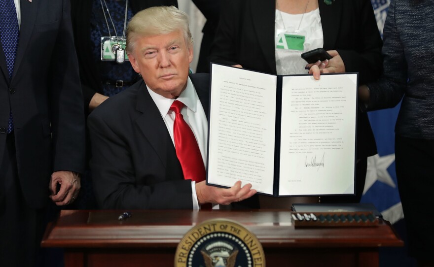 President Trump signs the first travel ban. The second ban has been stayed, for now, but some say it's still affecting American higher education.