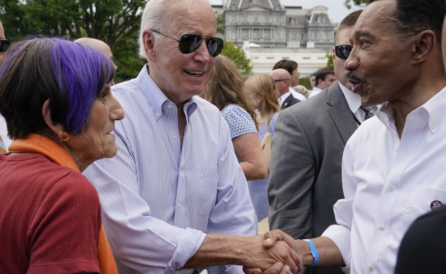 Hours before he flew to Israel, President Biden worked the crowd at the congressional picnic at the White House, shaking hands with lawmkers like Rep. Kweisi Mfume, D-Md.