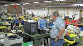 Dennis Charlton, president of Neese de México, works on the plant floor in Piedras Negras.