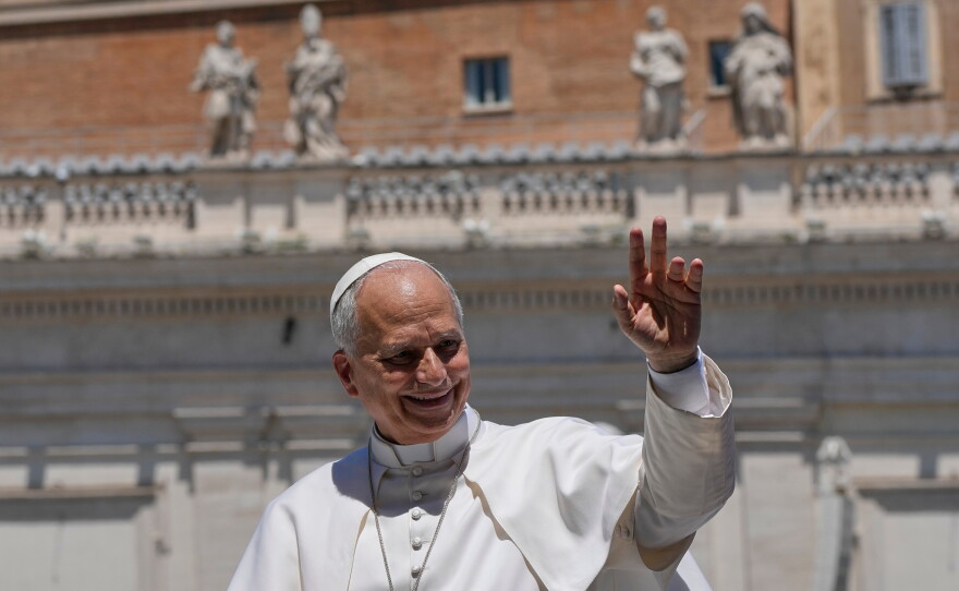 Pope Leo XIV waves as he leaves after his weekly general audience in St. Peter's Square at The Vatican, Wednesday, May 27, 2026.