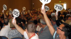 Bids at Monday night's auction in Baltimore started at $329,000 for townhomes that were listed for more than $1 million just two months ago.