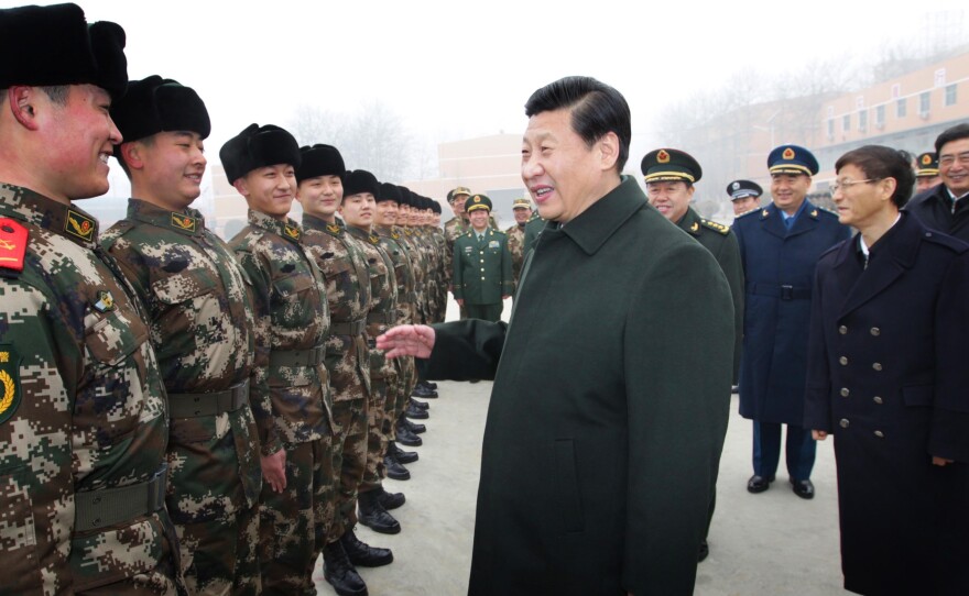 Chinese President Xi Jinping (center) talks with members of the Chinese People's Armed Police Force in Beijing. China has been increasingly assertive in Asia and many U.S. allies want the U.S. to have a strong presence in the region as a counterbalancing force.
