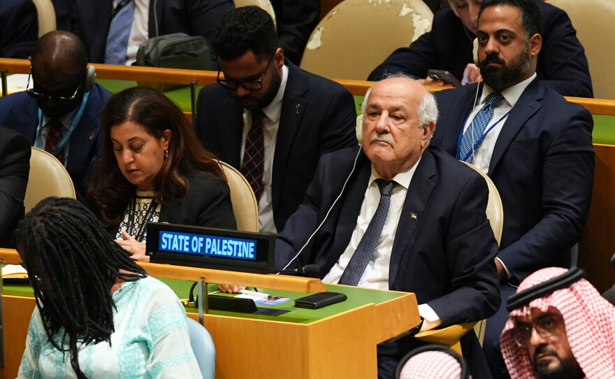 Palestinian ambassador to the U.N. Riyad Mansour, right, attends the 80th session of the United Nations General Assembly, Tuesday, Sept. 23, 2025, at UN headquarters