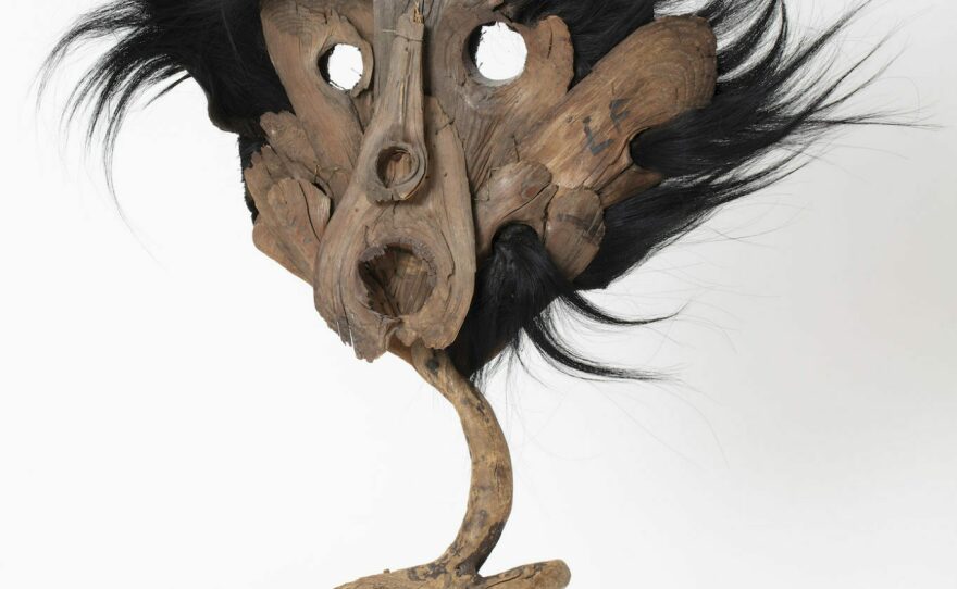 Black Scarecrow mask, Leonor Fini, c.1960, Round holes for eyes, black thick felt fabric, mounted on stand of driftwood tree branch (found in Corsica)