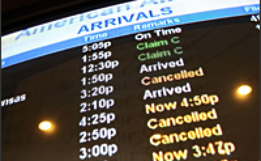 An American Airlines arrivals list at New York City's LaGuardia Airport on Thursday.