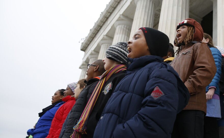 After the speech, the whole class sings three Civil-Rights-inspired songs together, including "We Shall Overcome."