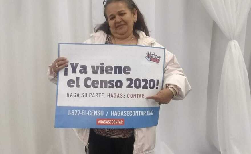 Undated photo of Estela Chamu holding a sign for the 2020 Census in North County San Diego. 