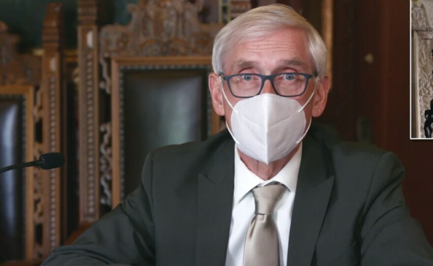 A Wisconsin judge upheld Gov. Tony Evers' order mandating that face coverings be worn in enclosed spaces statewide, save for a few exceptions. A conservative legal group challenged the measure arguing Evers overstepped his authority in issuing successive emergency orders.