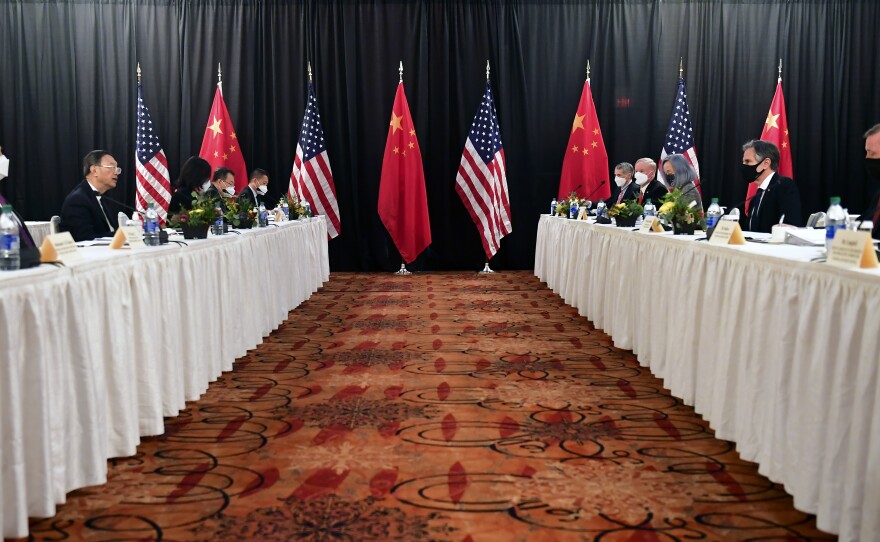 Secretary of State Antony Blinken, second from right, joined by national security adviser Jake Sullivan, right, speaks while facing Chinese Communist Party foreign affairs chief Yang Jiechi, second from left, and China's State Councilor Wang Yi, left, at the opening session of US-China talks at the Captain Cook Hotel in Anchorage, Alaska on Thursday.