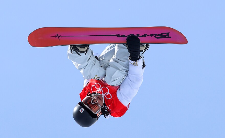 Ayumu Hirano of Team Japan performs a trick in the final gold-medal run during the Men's Snowboard Halfpipe Final.