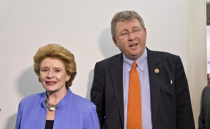 Senate Agriculture Committee Chairwoman Sen. Debbie Stabenow, D-Mich., and House Agriculture Committee Chairman Rep. Frank Lucas, R-Okla., during a break in negotiations on the Farm Bill Dec. 4. On Tuesday, Stabenow said the bill likely won't pass Congress until January.