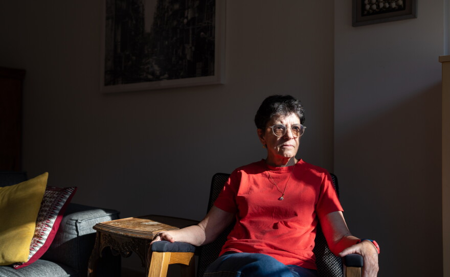 Anat Saragusti, an Israeli journalist who reported from Gaza in the 1990s and early 2000s for Israeli Channel 12 TV, poses for a portrait in her home in Tel Aviv.